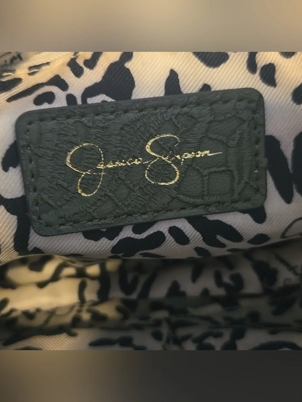 Jessica Simpson Gloria Mid Crossbody Bag in an embossed olive green floral finis